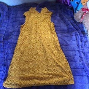 sleeveless gold dress